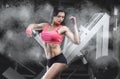 Slim, bodybuilder girl, does the exercises in the gym. Sport concept, fat burning and a healthy lifestyle