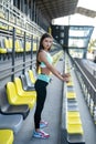 slim female athlete having rest afret workout in sport clothing