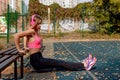 Slim Fitness Woman During Her Workout On The Street Sport Playground