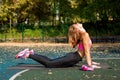 Slim Fitness Woman During Her Workout On The Street Sport Playground