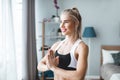 Slim girl practicing yoga at home, wellness, prayer pose Royalty Free Stock Photo