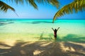 Young beautiful asian girl in bikini enjoy summer holidays on tropical paradise beach. Summer vacation and LifeStyle concept. Royalty Free Stock Photo