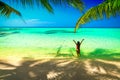 Young beautiful asian girl in bikini enjoy summer holidays on tropical paradise beach. Summer vacation and LifeStyle concept. Royalty Free Stock Photo