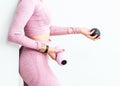 Slim sexy woman girl training with rubber ball, massage peanut ball equipment for yoga in pink tight-fitting tracksuit Royalty Free Stock Photo