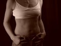 slim shapely woman's waist and torso Royalty Free Stock Photo