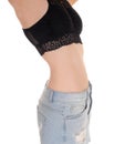 Slim stomach and of young woman Royalty Free Stock Photo