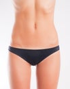 Slim woman in black knickers Royalty Free Stock Photo
