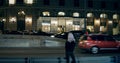 Woman standing highway night wearing urban wear in city centre. Royalty Free Stock Photo