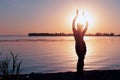 Slim woman illuminated with sunshine dancing traditional tribal belly dance Royalty Free Stock Photo