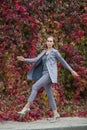 Slim woman marching at the street