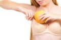 Woman small boobs puts big fruit in her bra