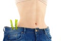 Slim Young Woman who Has Lost Weight Wears her Old Jeans Royalty Free Stock Photo