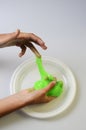 Pate slime elastic and viscous on child`s hand