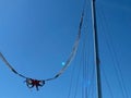 Slingshot attraction on the top of Tahtali mountan with cloudy blue sky background