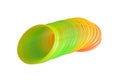 Slinky Spring Toy Colorful Plastic Folding Rainbow Circle isolated on a white background Royalty Free Stock Photo