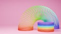 Slinky toys on pink background. Rainbow spring. 3D rendering.