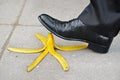 Slip and fall on a banana skin Royalty Free Stock Photo