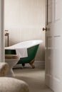 Slipper bath in ensuite bathroom of hotel room Royalty Free Stock Photo