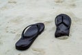 Slippers on a sandy Royalty Free Stock Photo