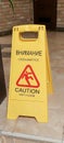 Slippery floor sign.  Danger.  Warning sign.  Yellow sign Royalty Free Stock Photo