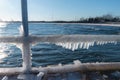 Slippery frozen pier in Denmark Baltic sea Scandinavia