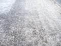 Slippery frozen road after freezing rain