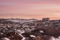 Slippery path to an abandoned weather station on a hill. The harsh polar evening landscape