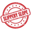 SLIPPERY SLOPE text on red grungy round rubber stamp