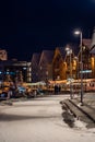 Snow covered pavement in Tromso harbour