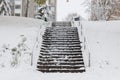 Slippery stairs after first snow in park