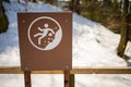 `Slippery Surface` road sign in city park. Royalty Free Stock Photo