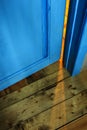 Slit in the slightly opened door Royalty Free Stock Photo