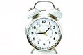 Sliver alarm clock isolated on white background, a vintage retro old style alarm clock showing time with clipping path Royalty Free Stock Photo