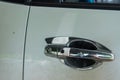 Sliver car door handle.White car