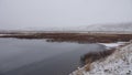 Sloddfjorden on Hardangervidda plateau covered in snow in autumn in Norway Royalty Free Stock Photo