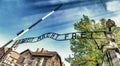 The slogan arbeit macht frei (work sets you free) on the main gate of German concentration camp. Discrimination and persecutio Royalty Free Stock Photo