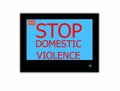Slogan STOP DOMESTIC VIOLENCE on television screen Royalty Free Stock Photo
