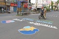 Slogans are painted on the road as part of a campaign to get people to comply with the lockdown to prevent coronavirus.