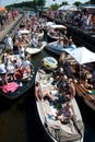 Sloop boats waiting for bridge