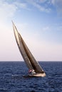 Sloop sailboat USA 18 sailing in open waters. Royalty Free Stock Photo