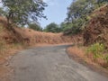 Slope empty road through the mountain