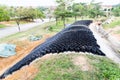 Slope erosion control with grids and earth on steep slope Royalty Free Stock Photo