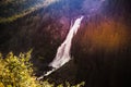 Mountain covered with dense forest and waterfall Royalty Free Stock Photo