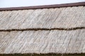 The slope of the roof of reeds and straw