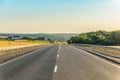 Slope rural asphalt road with marking and guard rails Royalty Free Stock Photo