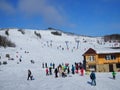 The slope of the ski resort with a ski lift and athletes with skis and snowboards frosty day. Khvalynsk-06 February 2019