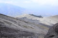 On the slopes approaching the peak of Mount Merapi which is rocky and sandy