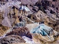 Slopes at Artists Palette in Death Valley, California. Various mineral pigments have colored the volcanic deposits found here