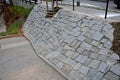 Sloping paving under the bridge between the roads, anti-erosion reinforcement, reinforcement of the embankment slope. paving of ir