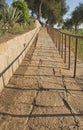 Sloping stone path in rural countryside grounds